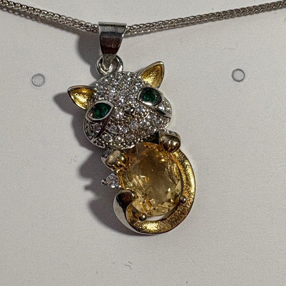 Elegant Cat Pendant Necklace with Gold and Silver Accents